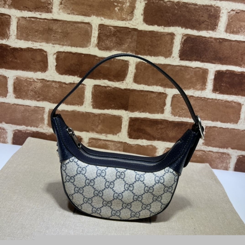 G*u*i top handle bags